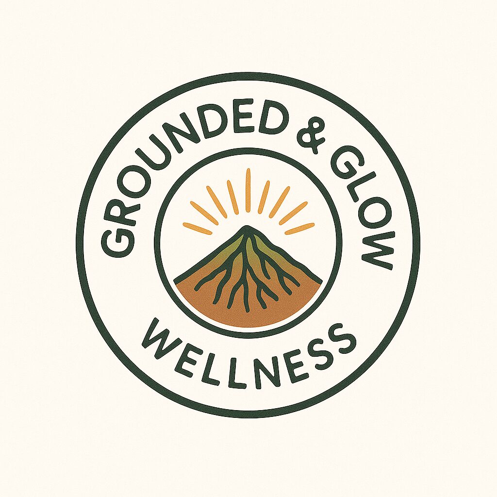 Logo with mountain and sun rays for Grounded & Glow Wellness.