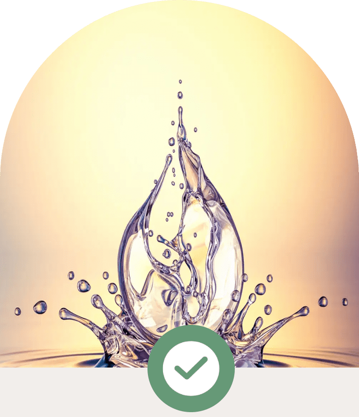 Artistic water splash shaped like a flame against a light background.